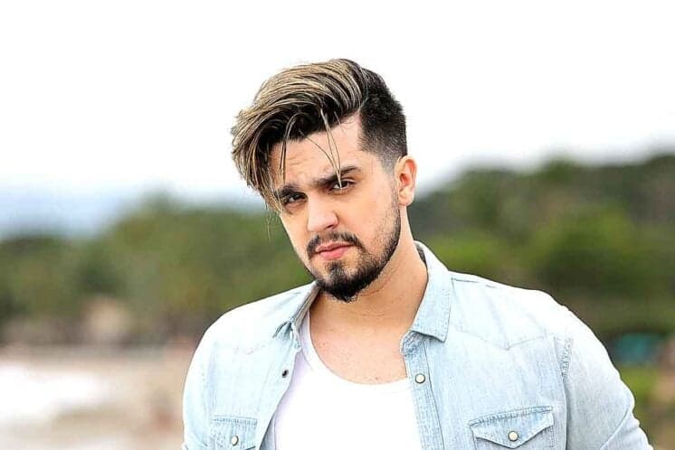 Serginho Groisman se refere a Luan Santana como "colega de emissora" em gravação do Altas Horas