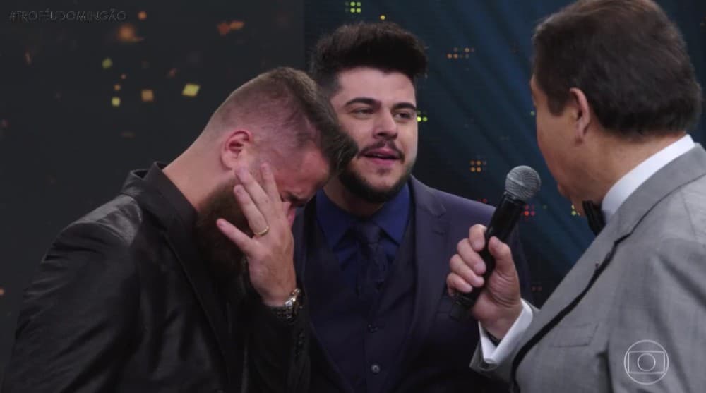 Zé Neto e Cristiano no palco do Domingão (Foto: Reprodução/Globo) Zé Neto e Cristiano no palco do Domingão (Foto: Reprodução/Globo)