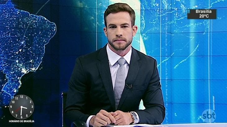 Daniel Adjuto na bancada do SBT Brasil (foto: Reprodução/SBT) Daniel Adjuto na bancada do SBT Brasil (foto: Reprodução/SBT)