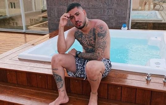 O famoso cantor e funkeiro, Kevinho deixou os seus seguidores de queixo caído milhares de vezes ao longo ano passo ao compartilhar fotos ousadas nas redes sociais (Foto: Reprodução/Instagram) O famoso cantor e funkeiro, Kevinho deixou os seus seguidores de queixo caído milhares de vezes ao longo ano passo ao compartilhar fotos ousadas nas redes sociais (Foto: Reprodução/Instagram)