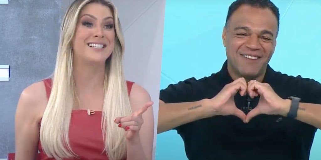 Renata Fan, ao vivo na Band, cruza as pernas, vai nas alturas com vestidinho explodindo e declara a Denilson: "Meu"