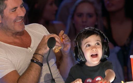 Simon Cowell e o filho Eric (Foto: Reprodução) Simon Cowell e o filho Eric (Foto: Reprodução)