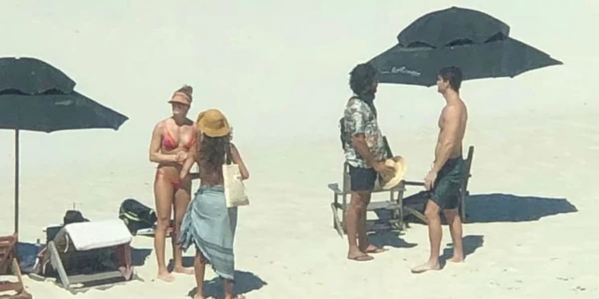 Grazi Massafera na praia junto com o seu novo namorado (Imagem: Reprodução/Leo Dias/Metrópoles) Grazi Massafera na praia junto com o seu novo namorado (Imagem: Reprodução/Leo Dias/Metrópoles)
