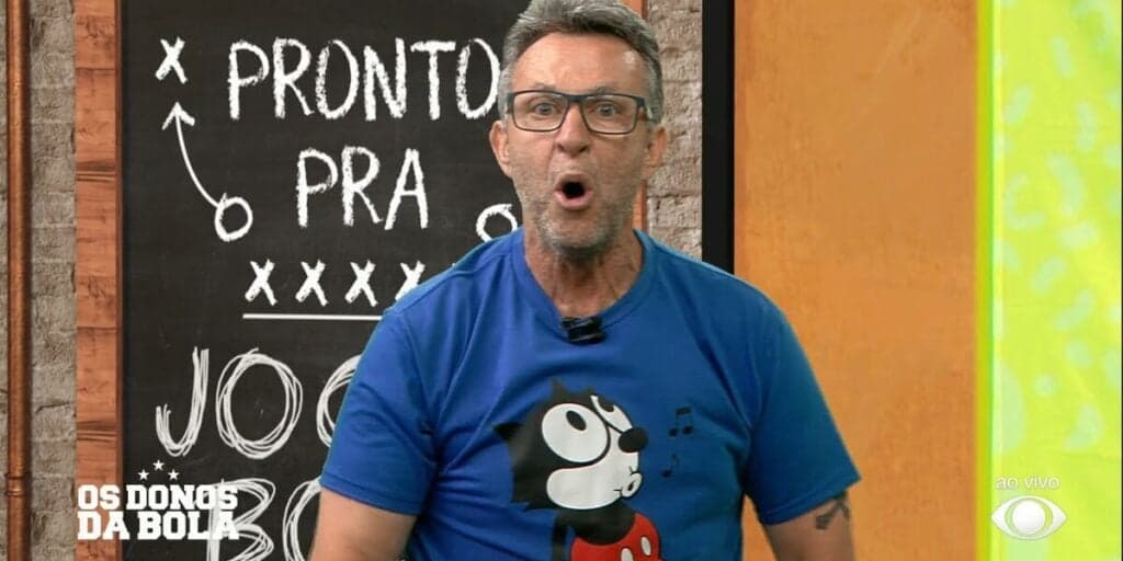 Neto surta na Band, arranca óculos de comentarista, ataca no chão e pisoteia objeto ao vivo
