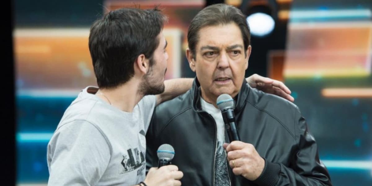 João Guilherme Silva e Faustão em programa extinto (Foto: Divulgação/Band)