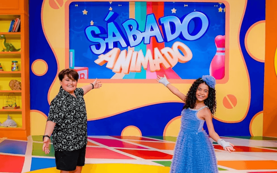 Theo Radicchi e Wallentina Bomfim no Sábado Animado (Foto: Reprodução / SBT)
Theo Radicchi e Wallentina Bomfim no Sábado Animado (Foto: Reprodução / SBT)