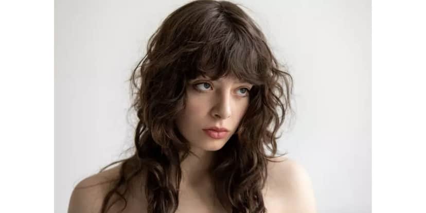 Cabelo com ondas largas com degradê (Foto: Freeman Studio | Shutterstock / Portal EdiCase) Cabelo com ondas largas com degradê (Foto: Freeman Studio | Shutterstock / Portal EdiCase)