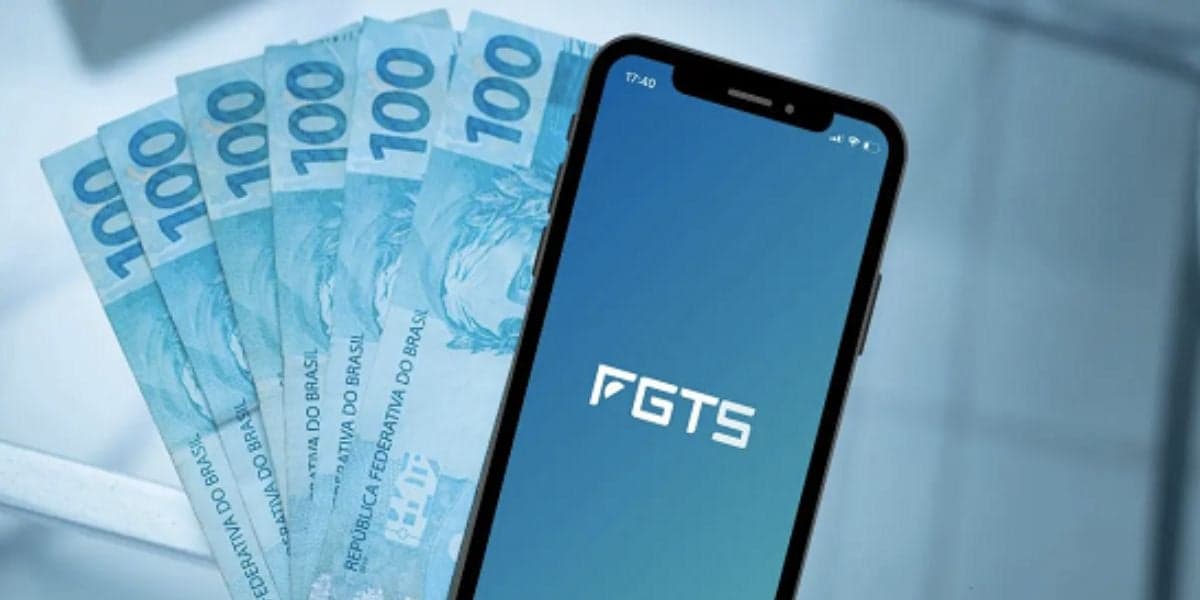 Aplicativo FGTS e notas de cem reais (Foto: Reprodução / Ascom unit) Aplicativo FGTS e notas de cem reais (Foto: Reprodução / Ascom unit)